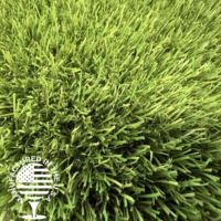 Close up image of artificial turf with a Manufactured in the USA logo in the bottom left.