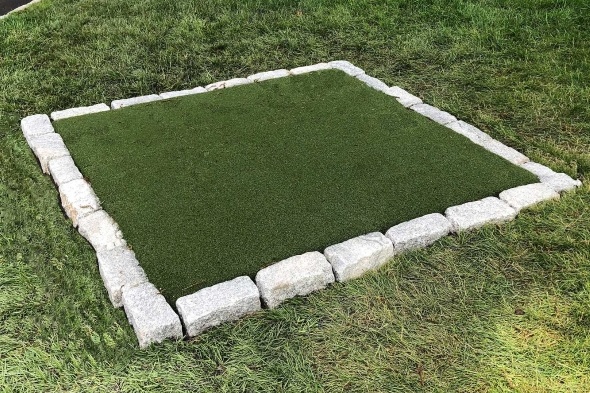 Oakley Tee box made of synthetic grass surrounded by stone border